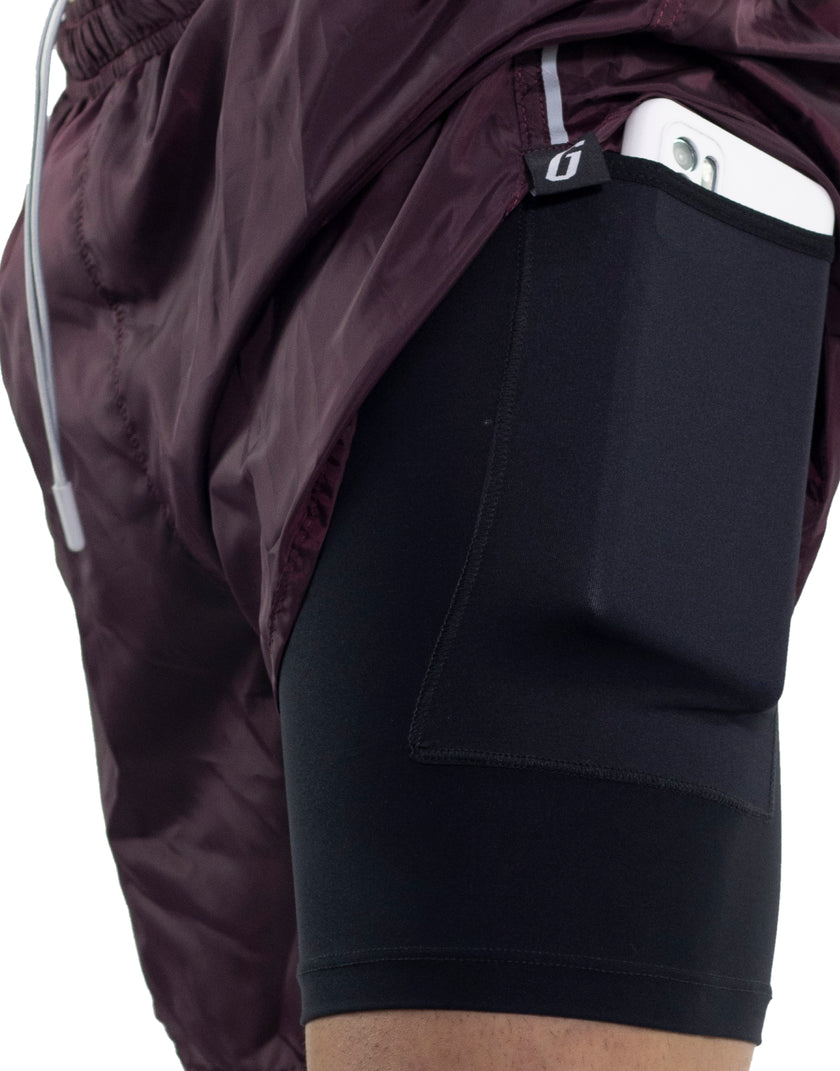 PANTALONETA RUNNING CON BOLSILLO VINO - Gavia